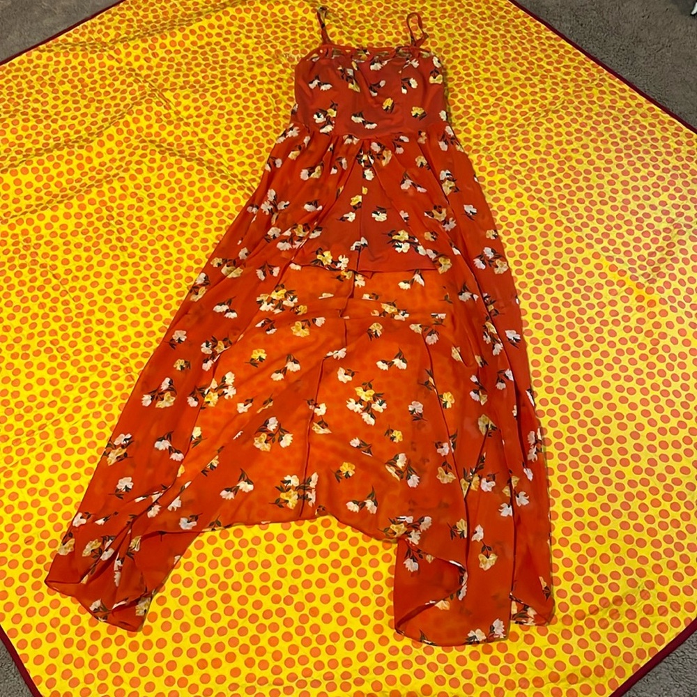 Red orange romper with flowers and flow